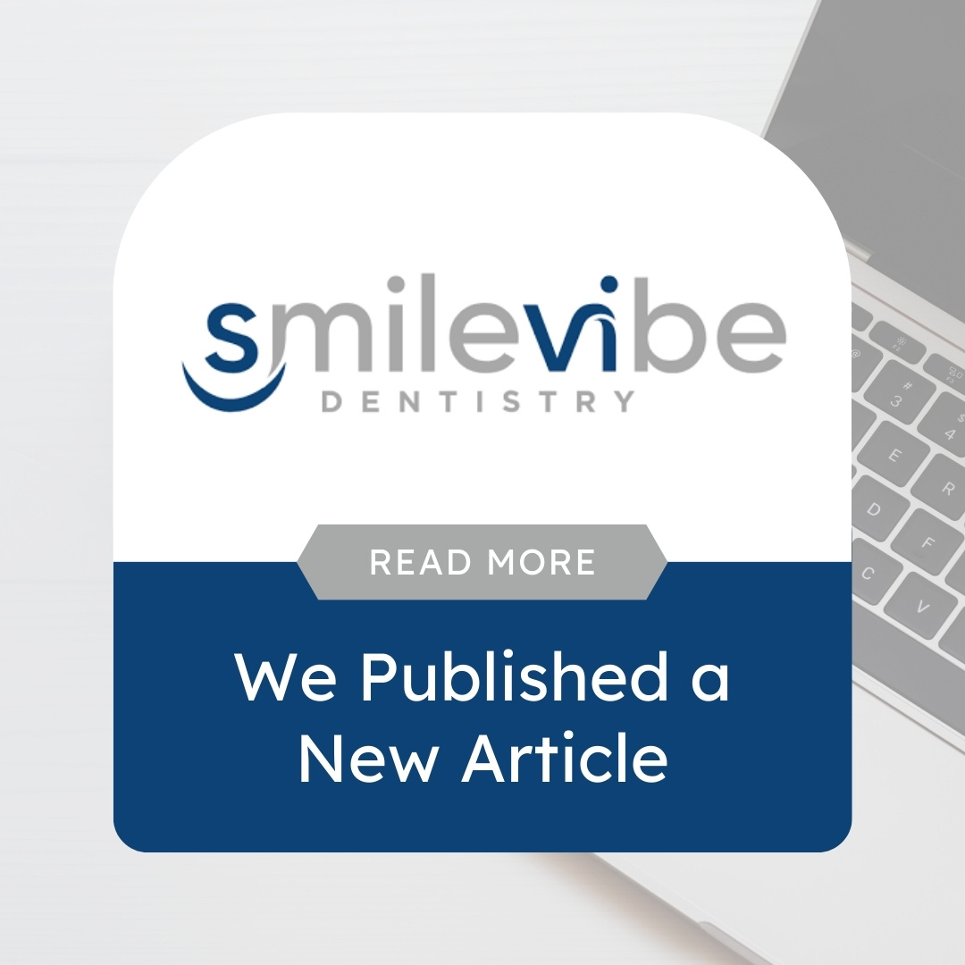 A graphic featuring the SmileVibe Dentistry logo and the text "We Published a New Article" over a background of a laptop keyboard.